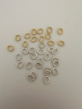 Oval Shape Twisted Rings | About 125 Pcs. | Gold Finish and Silver Plated | Closed Rings | Decorated | Size: 6mmX7mm .