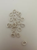 Oval Shape Twisted Rings | About 125 Pcs. | Gold Finish and Silver Plated | Closed Rings | Decorated | Size: 6mmX7mm .