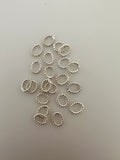 Oval Shape Twisted Rings | About 125 Pcs. | Gold Finish and Silver Plated | Closed Rings | Decorated | Size: 6mmX7mm .