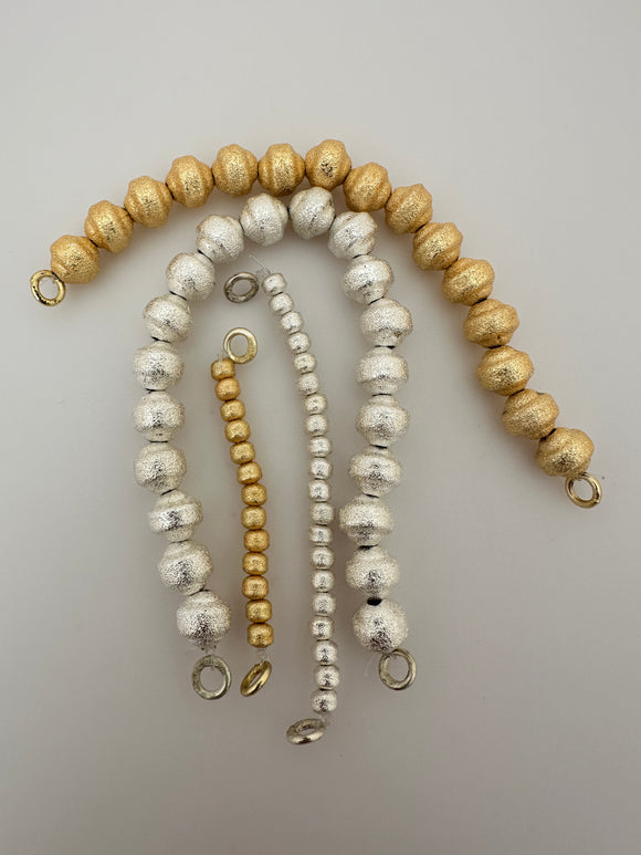 1 Strand of Brushed Finish Fancy Shiny Round Gold Finish and Silver Plated  Beads , E-coated Beads. Bead Available Four  Size is: 6mm ,8mm ,10mm,12mm