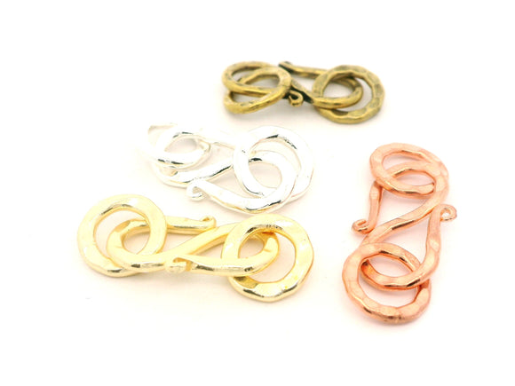 A Pack of Hammered S Hook, Made out of Copper/Brass Available in 5 colors- Gold, Silver, Copper, Brass and Gunmetal. Size: 18X10mm.