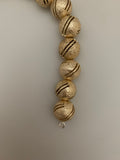 1 Strand of Brushed Finish Fancy Shiny Round Gold Finish Beads , E-coated Beads. Bead Size is: 15mm