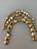 1 Strand of Heart shape  Brushed Finish   Beads, Gold finish and Silver Plated  E-coated (about 13to 22  Beads in strand ))