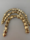 1 Strand of Heart shape  Brushed Finish   Beads, Gold finish and Silver Plated  E-coated (about 13to 22  Beads in strand ))