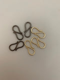 A Pack of 20 Pcs. of Hooks. Available in Two Colors. Gold Finish & Silver Plated. E-coated S hook, Made out of Copper/Brass. Size: 27mmX12mm