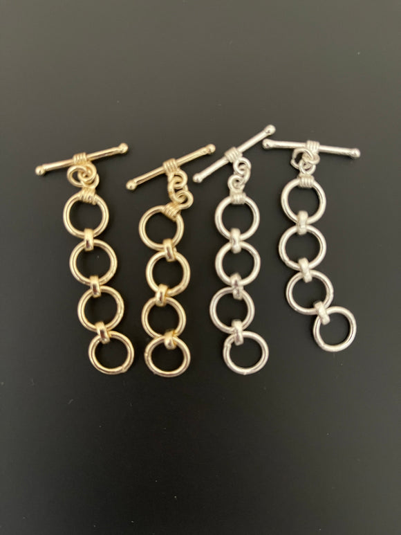 A Pack of 5 pieces of Adjustable Toggles, E-Coated, Designer's Adjustable Toggles, Available  2 Colors Gold finish and Silver Plated.