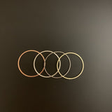 A Pack of Gold Plated Rings, that are E-Coated and Brushed Finished. You can find 4 colors with various different sizes.